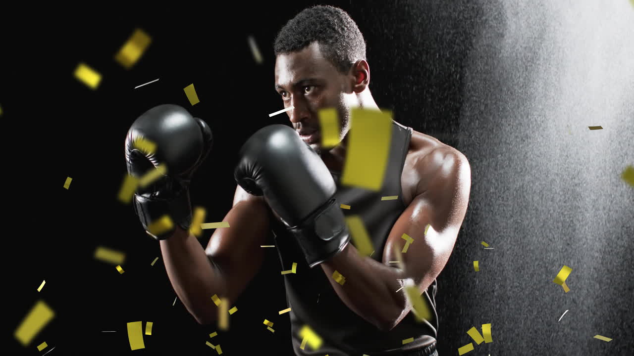 animación de confeti cayendo sobre un boxeador afroamericano en fondo negro