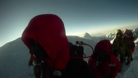 line of climbers approaching hilary step