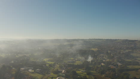 Controlled-burning-off-taking-place-on-beautiful-blue-sky-day-in-suburban-district