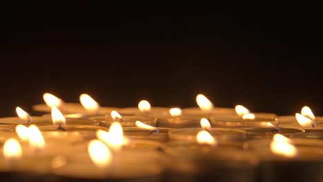 many lit candles