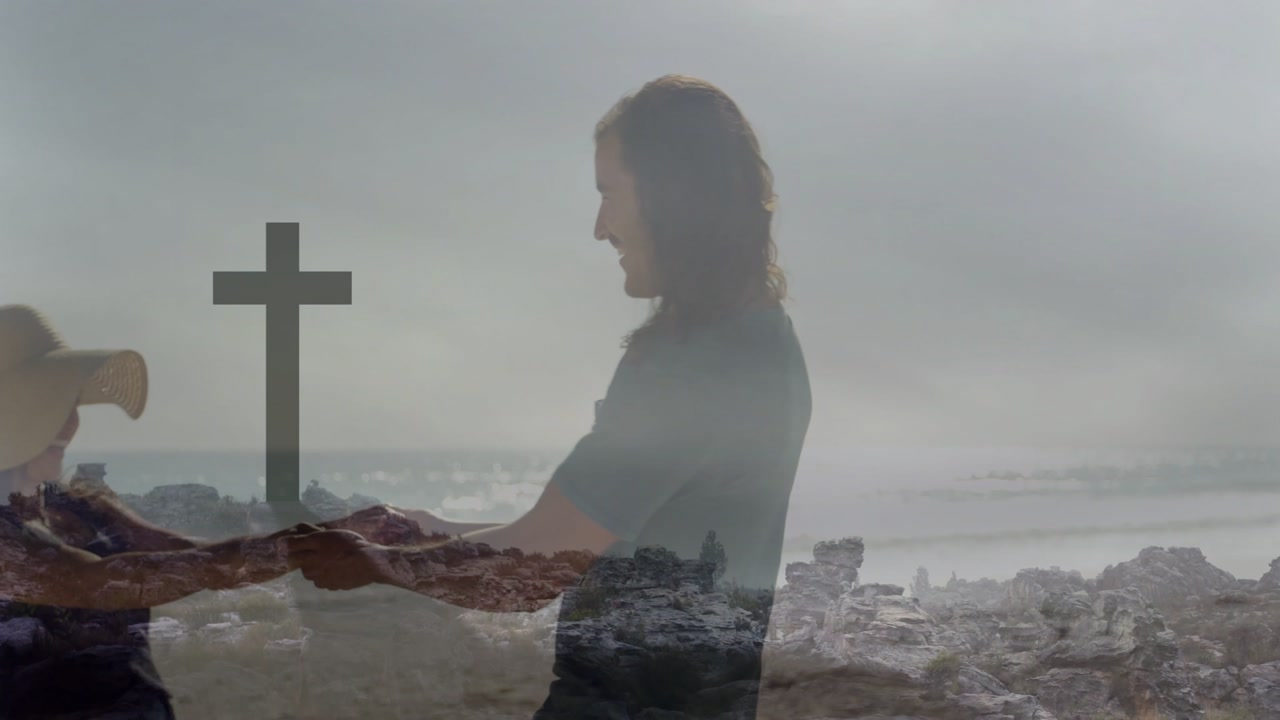Couple joining hands, pulling and turning on coast, showing travel bond with double-exposed cross