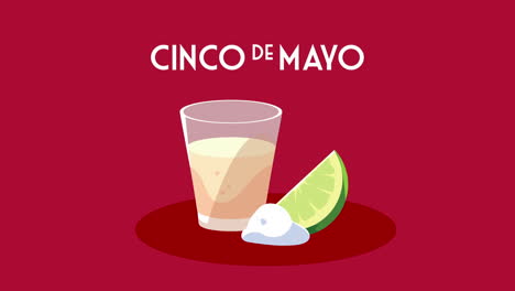 cinco de mayo lettering celebration with tequila cup and lemon