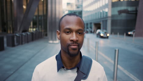 man walking in a city