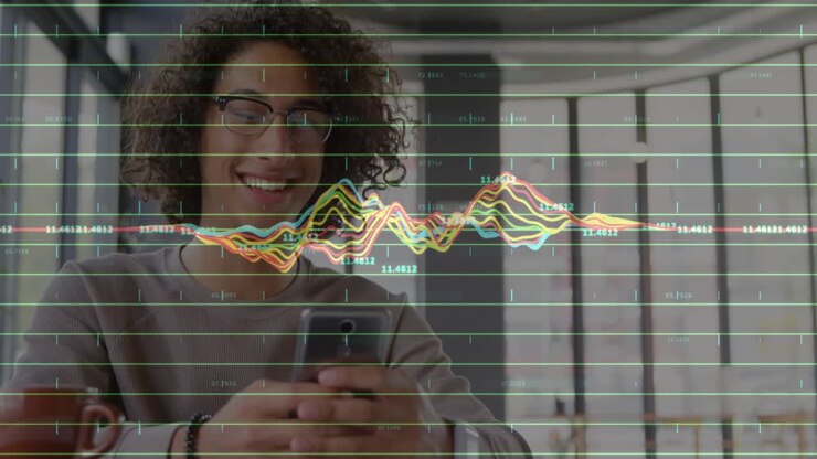En mand scroller finansdata på telefonen og tapper, hvilket får en svævende graf til at fremhæve en stigende tendens.