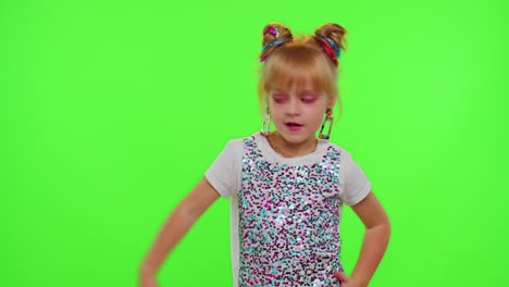 Happy-funky-blogger-child-kid-girl,-recording-funny-dancing-video-on-smartphone-for-social-network