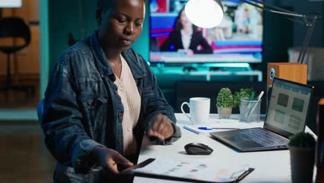 woman working late on a report