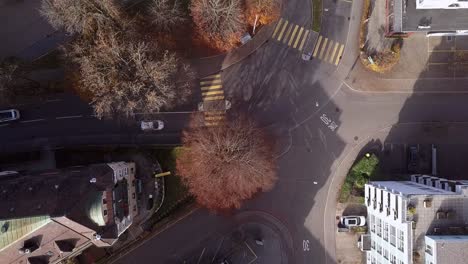 aerial top down drone view of cars moving, street travel concept, sankt gallen, switzerland