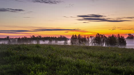 Low-lying-fog-over-the-river-at-sunrise---eerie,-mystical-time-lapse