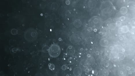 bokeh de partículas abstractas flotantes sobre fondo oscuro