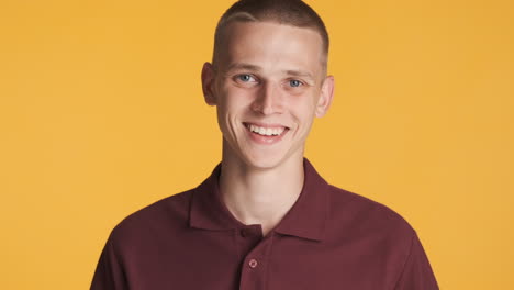 happy young guy laughing