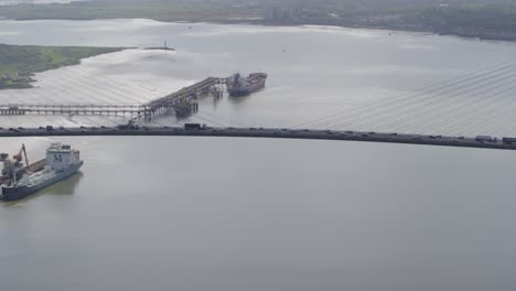 drone shot of queen elizabeth ii bridge , dartford thurrock river crossing, high view of traffic