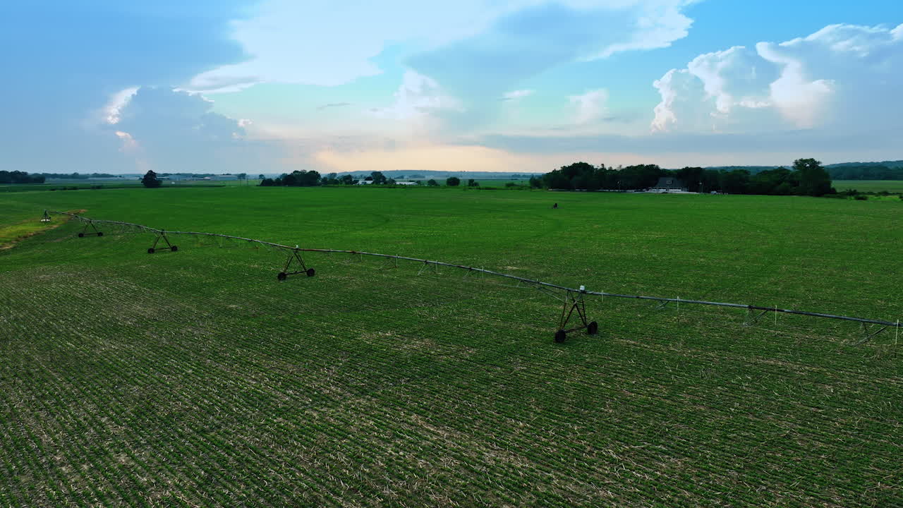 Irrigation system set on the green field. Close look at the circular farms with center-pivot- watering.