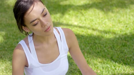 beautiful young woman in white shirt with grin