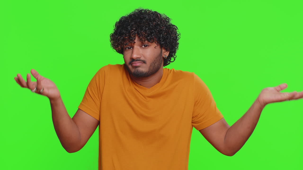 Tired bored indian man exhausted of tedious story not interested in communication talk displeasure