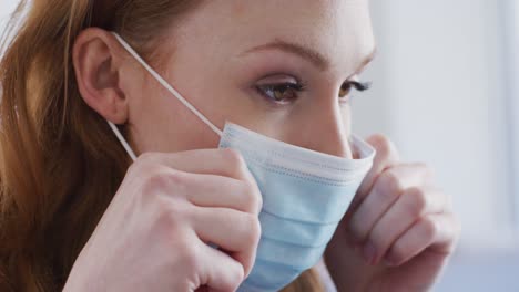 Close-up-view-of-woman-wearing-face-mask