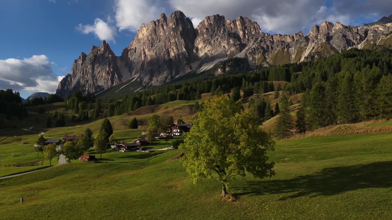 Pompagnon mountain range at Cortina d'Ampezzo, Dolomites, Italy. Val Grande valley. Sunset golden hour. alpine fields and mountains. Aerial view