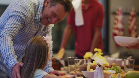 Happy-family-eating-dinner-together.