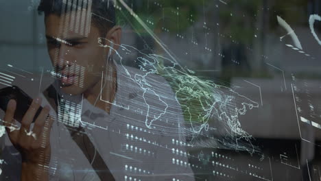 animation of interface with data processing over biracial man talking on smartphone outdoors