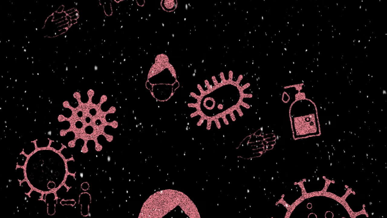 animación de células rosadas de covid 19 e iconos que se mueven sobre el paisaje de invierno cuando cae la nieve