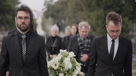 Pallbearers,-men-and-walking-with-coffin