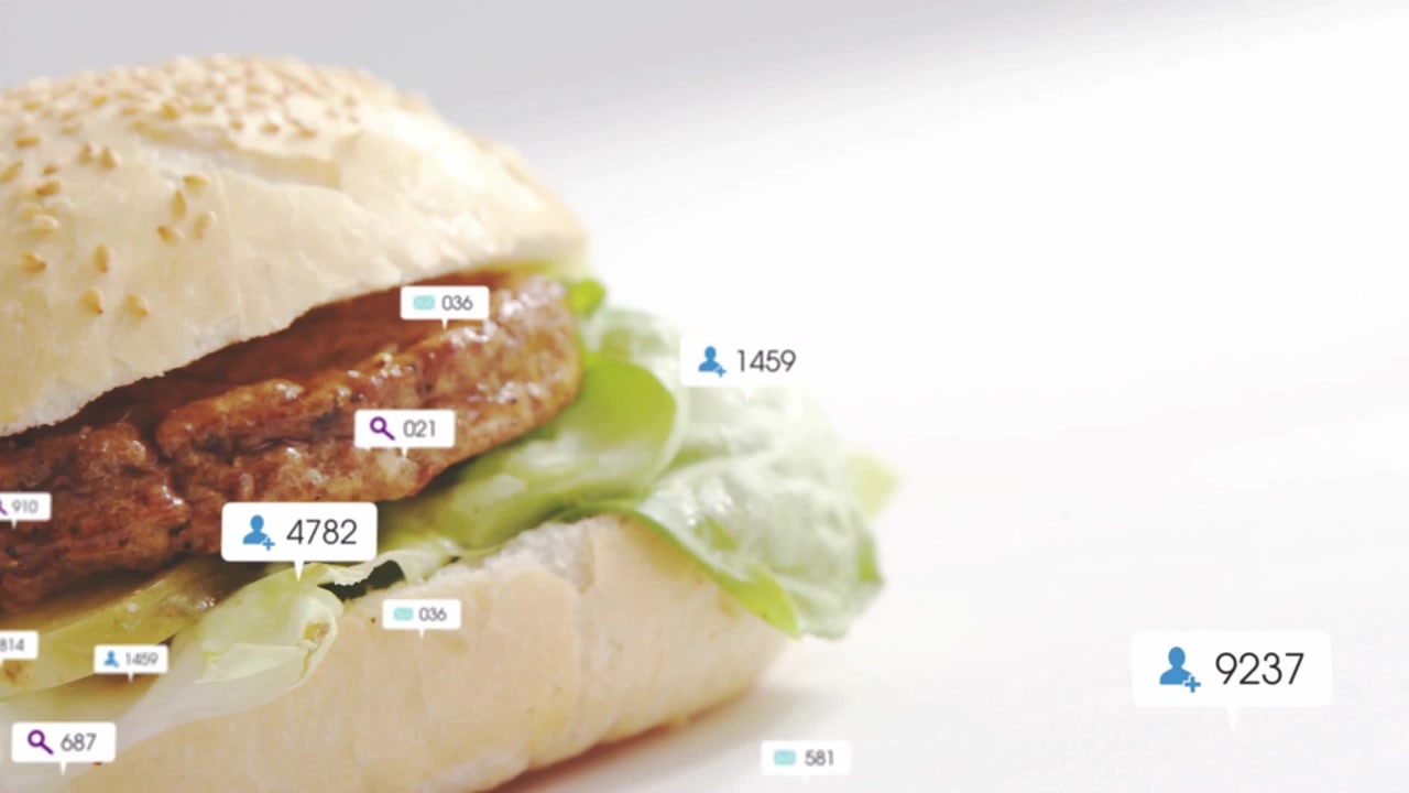 Badges drifting initiating sandwich revealing while search icons updating, showcasing food product