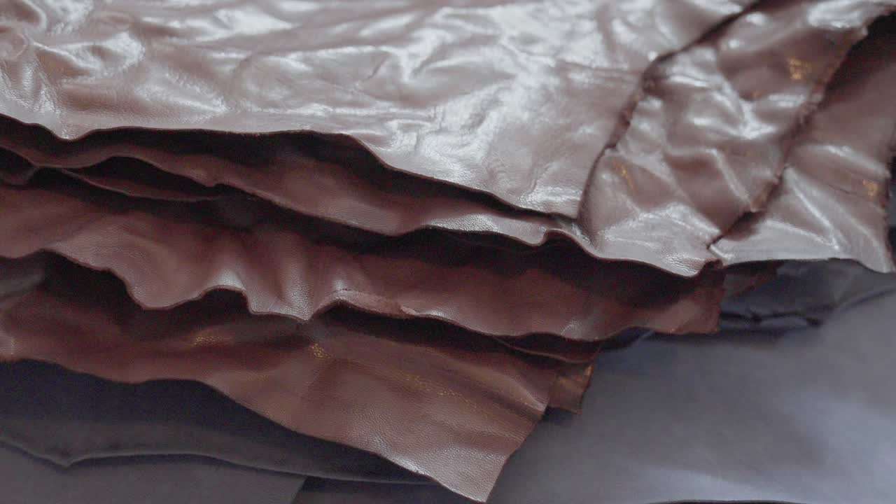 Close Up Shot Of Leather Animal Hides Stacked In A Textiles Manufacturing Factory