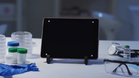 Tablet-computer-on-stand-on-a-desk-at-a-doctors-surgery