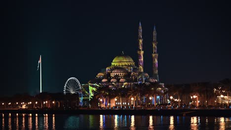 Al-Noor-Mosque-shines-with-colorful-lights-during-Sharjah-Light-Festival-2024-in-Sharjah,-UAE