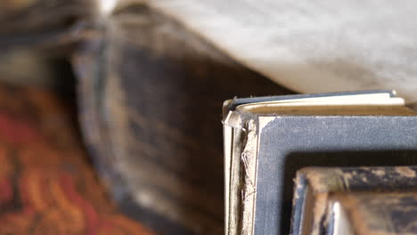 old vintage books, close up, tilt up