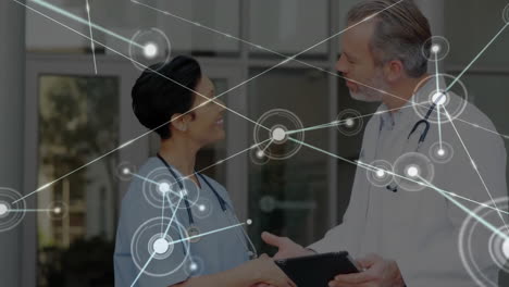 Animation-of-network-of-connections-over-diverse-doctors-using-tablet