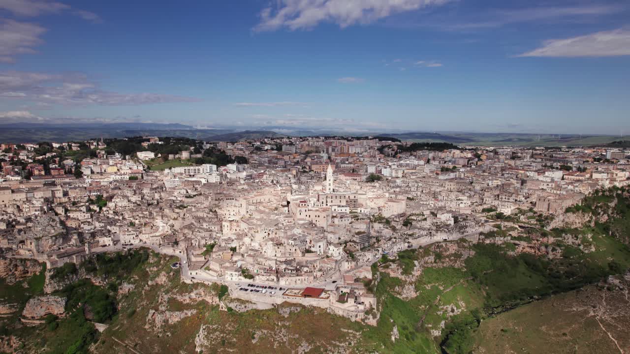 Aerial panoramic view of ancient old city Matera on a sunny day, Basilicata, Italy
