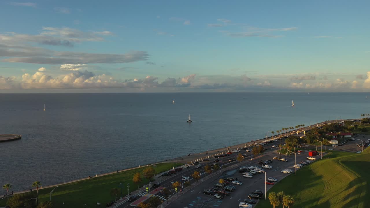 Sunsetting and sailboats on Lake Pontchratrain in New Orleans Louisiana