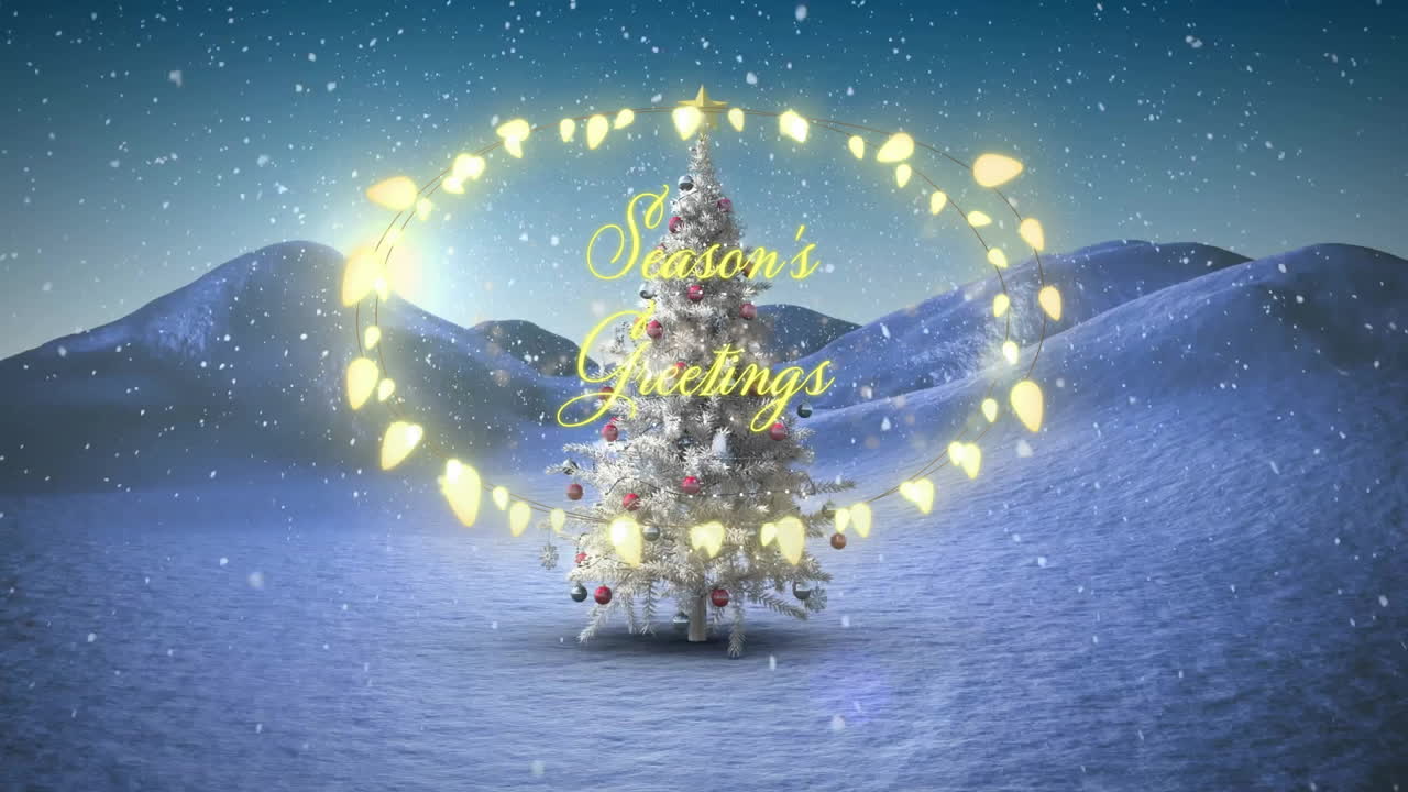 Snowy landscape with decorated Christmas tree and Season's Greetings text animation