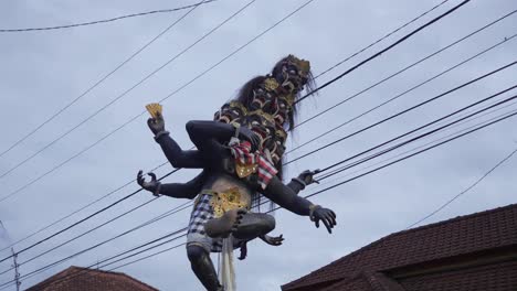 hindu gods statue parade on balinese day of silence nyepi bali indonesia
