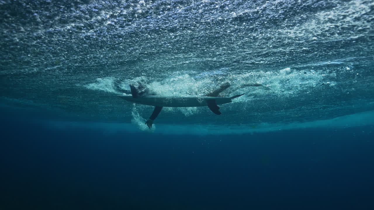 Surfer Underwater