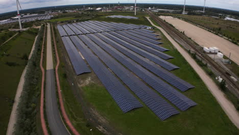 solar and wind energy plant in belgium, aerial drone view