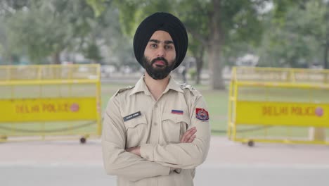 sikh indian police man looking at someone