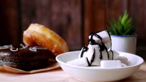 marshmallow and donuts on the table