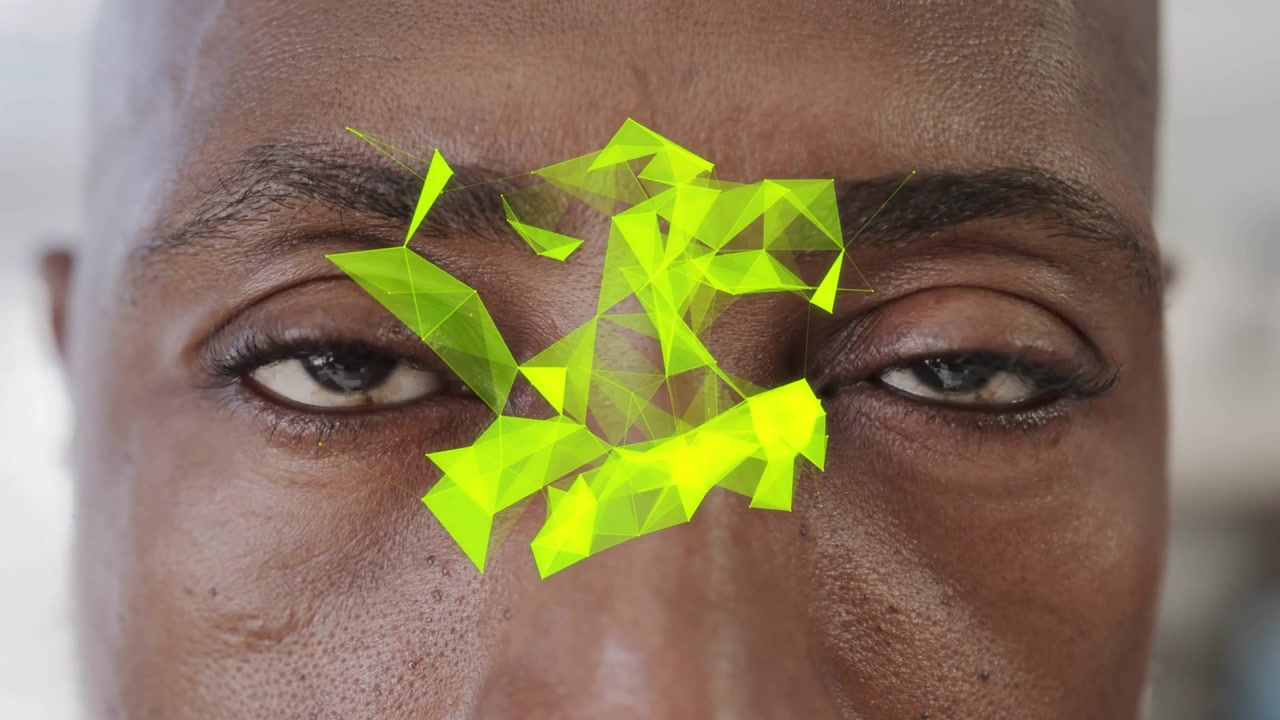 Mature man closing eyes while neon polygons forming on brow, opening eyes causing AR shifting right
