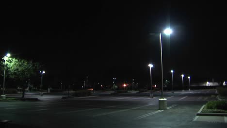 an empty parking lot at night