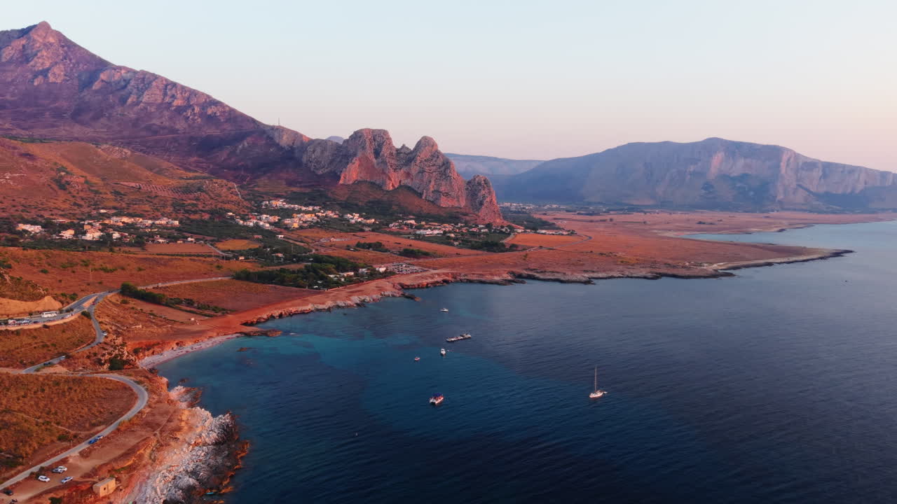 Sunset aerial view of Sicily coastline, tranquil and serene atmosphere