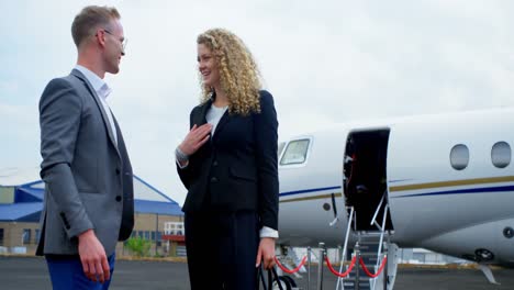 business people interacting with each other at terminal 4k