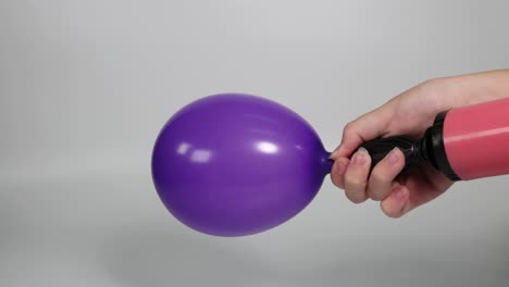 sequential inflation of a balloon by two hands