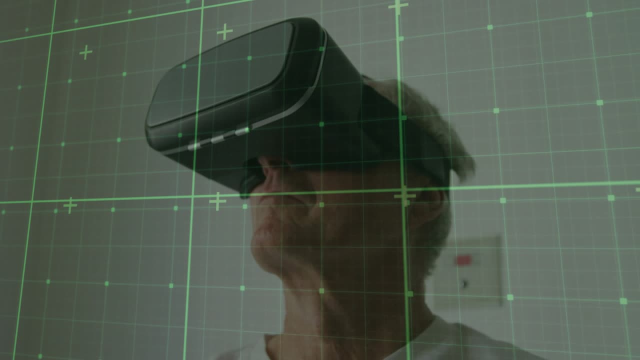 Senior man wearing VR headset initiating green grid overlay and scanning immersive simulation