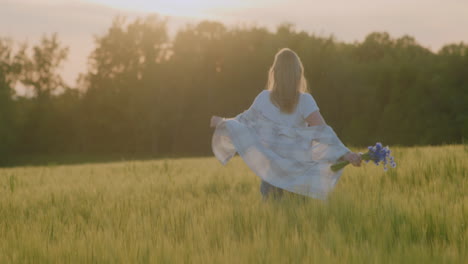 happy woman running through fields