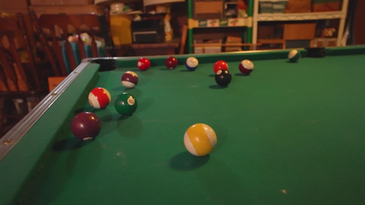 Slow motion pan left of the shot happening