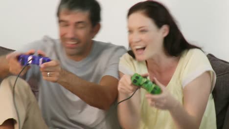 happy couple playing a video game