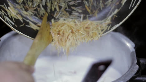 preparing "semiya payasam", also called kheer, a traditional indian pudding