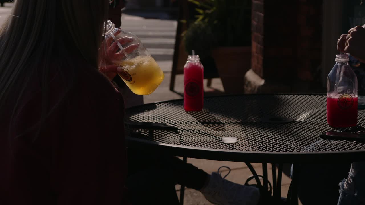 People enjoying a day outside and frozen drinks at Artsapalooza. Americus First Friday Art Event Sumter County Georgia
