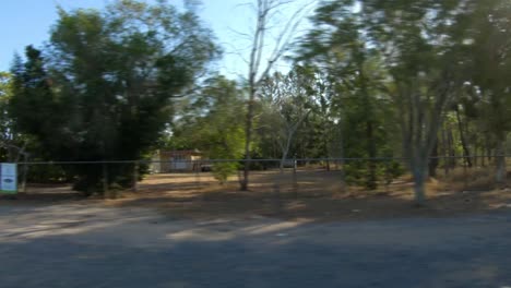 left facing driving point of view pov of quiet australian country roads - ideal for interior car scene green screen replacement